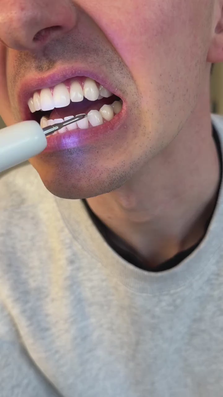PearlPik pen display and modes, then used on the teeth